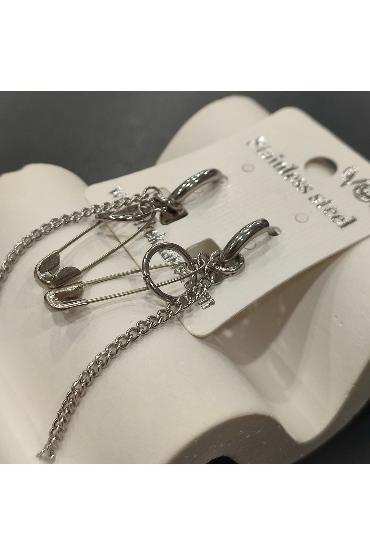 Stainless Steel Erkek Desenli ve Sallantılı Çelik Küpe